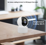 Load image into Gallery viewer, Indoor WiFi pet camera on wooden table showing no messy cabling and 2.4 GHz single-band wireless connection
