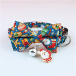 Load image into Gallery viewer, Adjustable blue Christmas pet collar with festive bow tie, silver bell, and Santa Claus charm for dogs and cats
