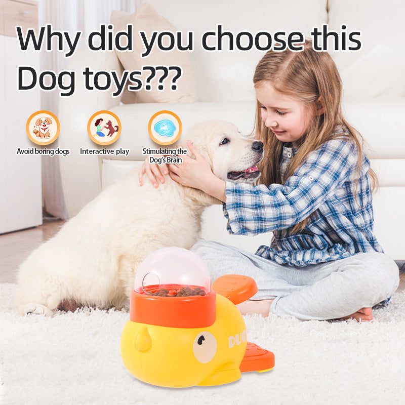 Young girl sitting with a golden retriever puppy and a yellow interactive duck-shaped dog puzzle feeder toy on carpet