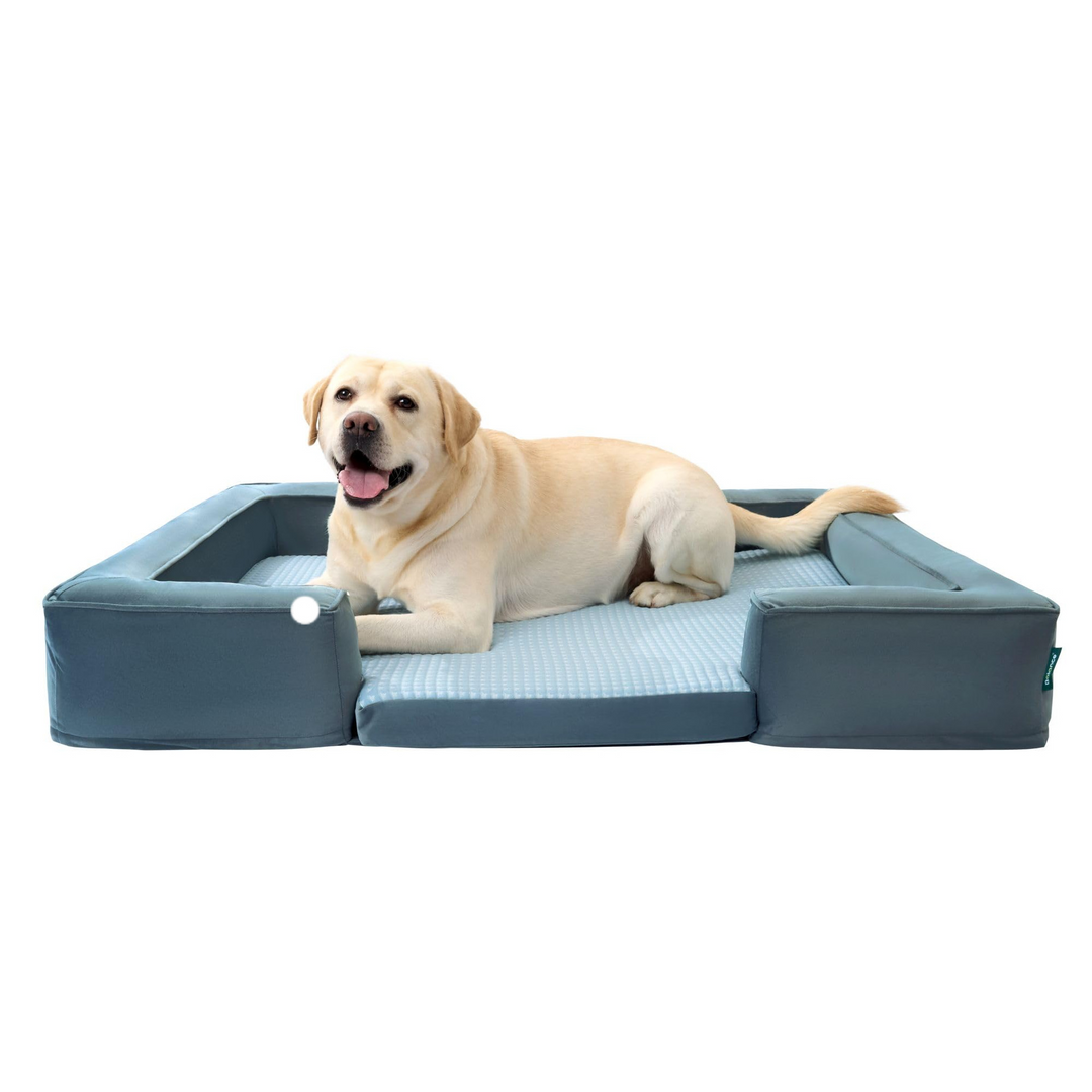 Labrador resting on a gray orthopedic dog bed designed for all-season comfort with washable and cool materials