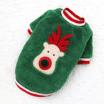 Load image into Gallery viewer, Green fleece dog sweater with red and white trim featuring a reindeer design for Christmas and winter holidays.
