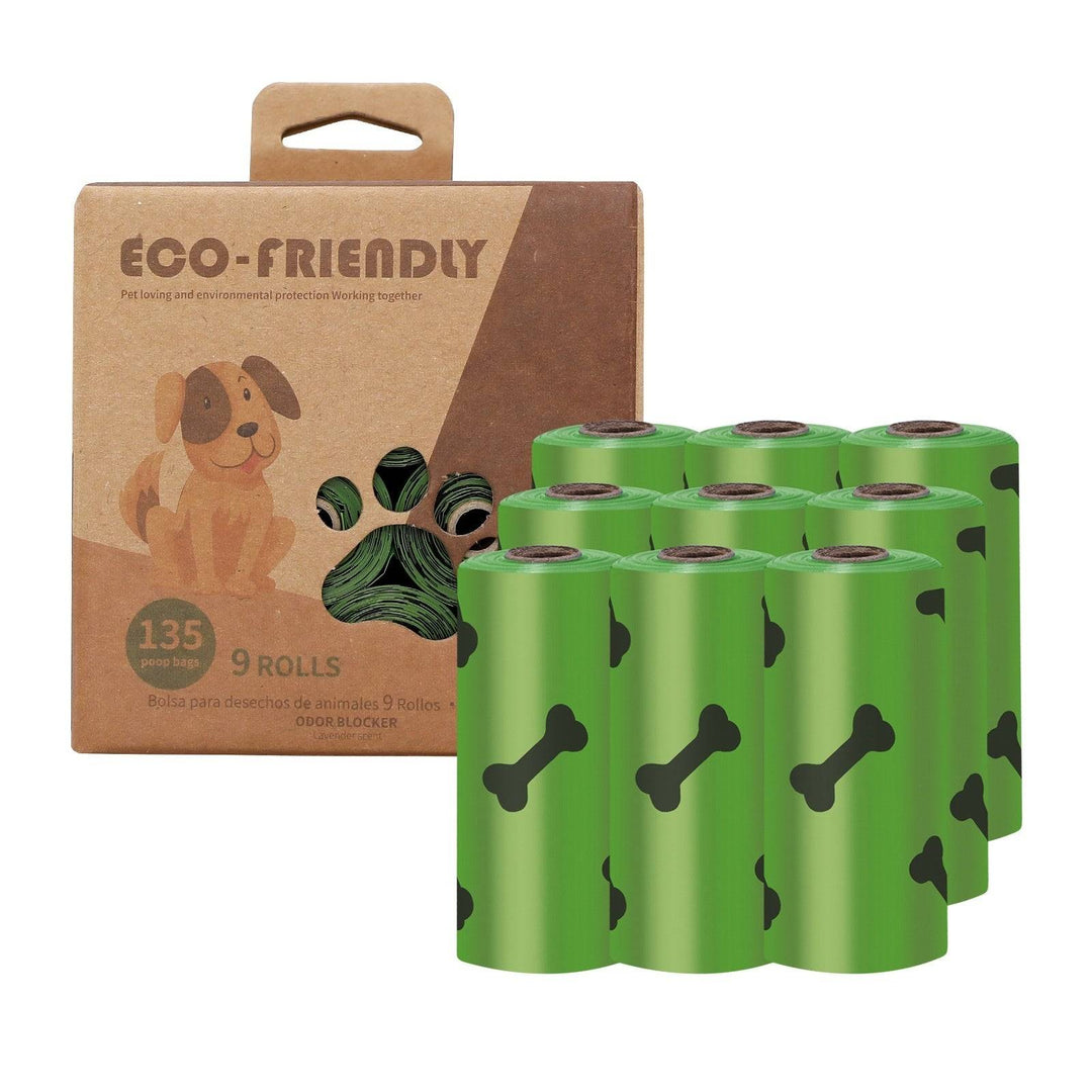 Eco-friendly green dog poop bag rolls with bone prints and recyclable cardboard packaging for easy pet waste cleanup.