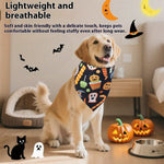 Load image into Gallery viewer, Golden retriever wearing Halloween bandana with pumpkin and ghost prints sitting near pumpkins and pet bowl indoors
