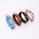 Load image into Gallery viewer, Adjustable leather pet collars with protective Airtag covers in blue, brown, green, and pink for cats and dogs tracking.
