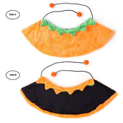 Reversible Halloween pumpkin pet cloak in orange and black with green trim, designed for dogs and cats.