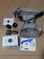 Load image into Gallery viewer, Grey pet recorder collar with GPS, camera accessories, remote control, and 32GB memory card on brown surface
