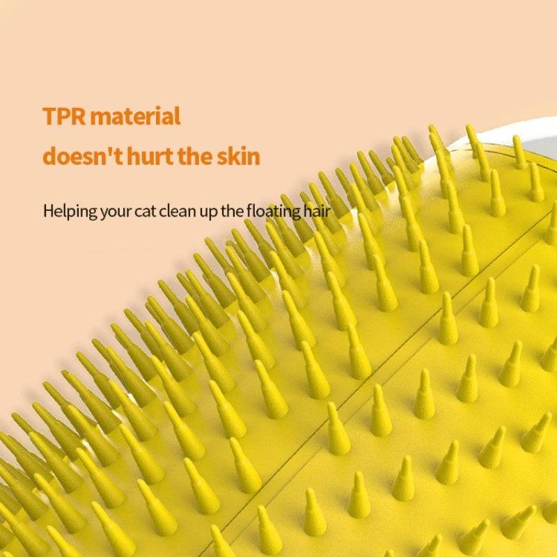Close-up of yellow TPR material pet hair brush with soft flexible bristles for gentle cat grooming and hair removal