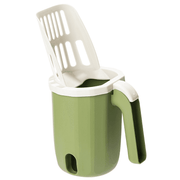 Green integrated cat litter scoop with large capacity deodorizing bin and ergonomic handle for easy waste disposal and odor control.