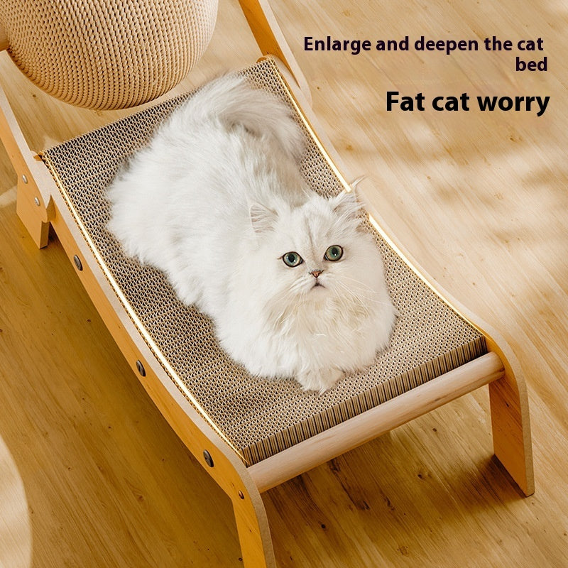 White fluffy cat lounging on a wooden recliner cat scratcher toy with deep claw board surface
