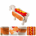 Load image into Gallery viewer, Dog wearing a funny hot dog costume with mustard detail and bun design, perfect for Halloween or pet parties.
