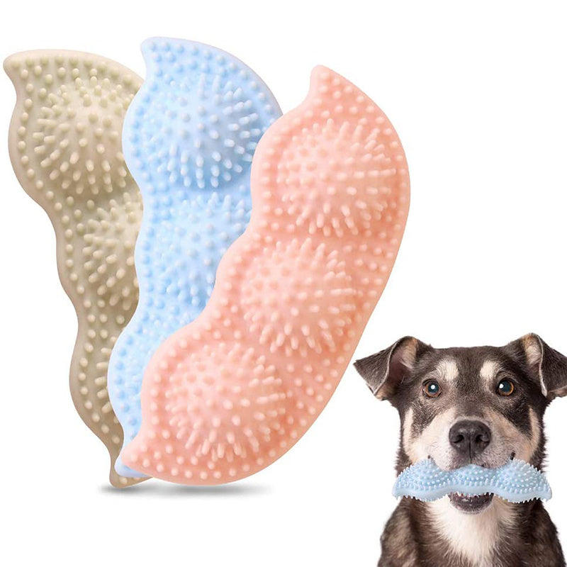 Three textured chew stick dog toys in beige, blue, and pink with a dog holding the blue one in its mouth