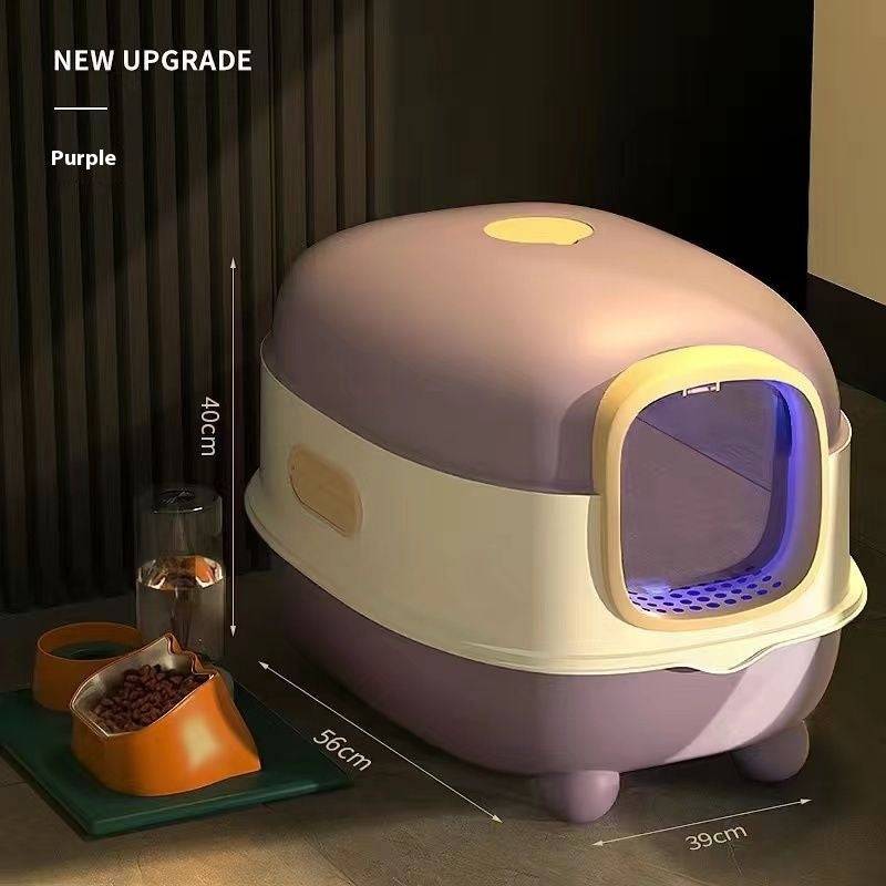 Oversized purple enclosed cat litter box with UV sterilization, odor-free, and easy-clean smart design, measuring 56x39x40cm.