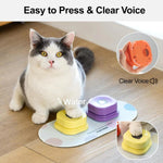 Load image into Gallery viewer, Cat pressing a yellow talking button on a mat with a purple button nearby for pet communication training

