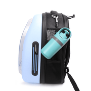 Portable teal dog poop bag dispenser attached to black pet backpack with blue hard shell compartment