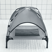 Gray outdoor pet tent bed with breathable mesh center and elevated frame, ideal for summer shade and airflow for dogs or cats.