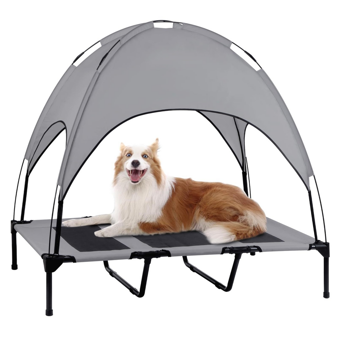 Dog resting on elevated pet tent bed with breathable fabric and summer shade canopy for outdoor comfort