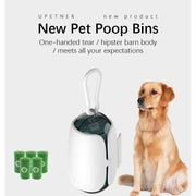 Portable degradable dog poop bag dispenser with clip and eco-friendly green bags next to golden retriever dog sitting
