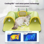 Load image into Gallery viewer, Cat resting comfortably on a breathable green cat tunnel bed with CoolingSilk cool sense technology for natural coolness.
